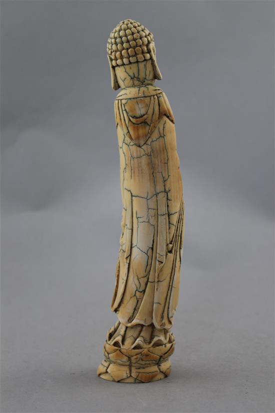 A Chinese ivory tusk carving of Buddha, Qing dynasty, 23.5cm.